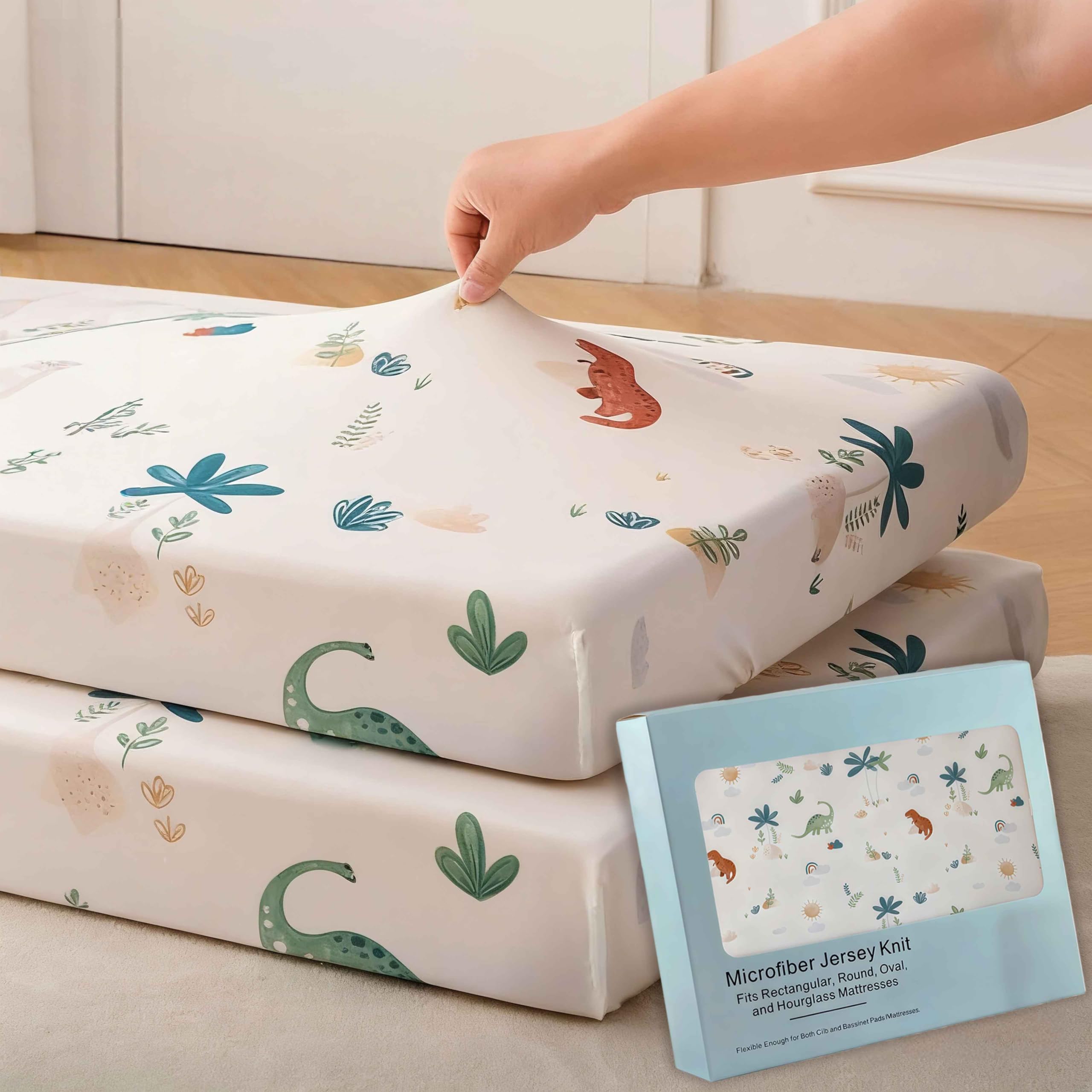 SDY Jersey Dinosaur crib sheets 2-pack laid flat for cozy sleep