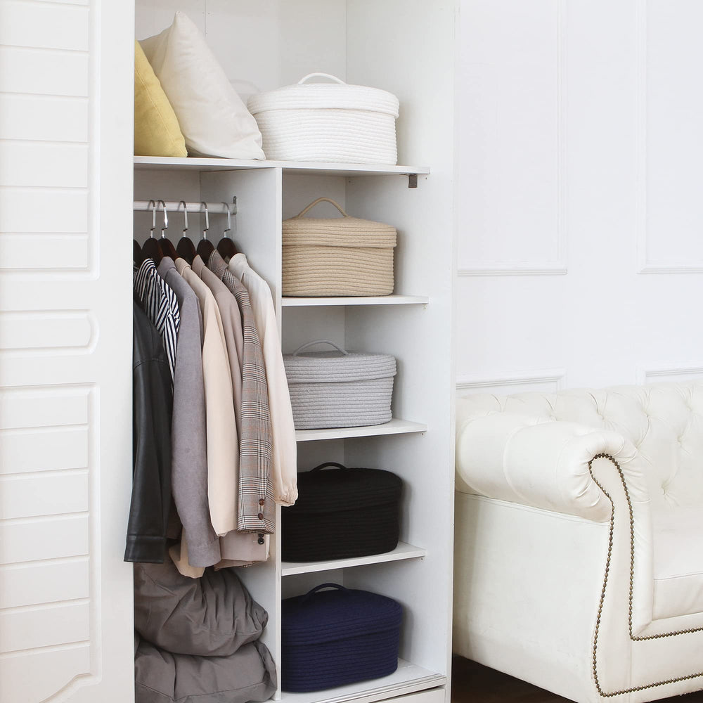 Sea Team khaki basket complements nursery decor while concealing items.