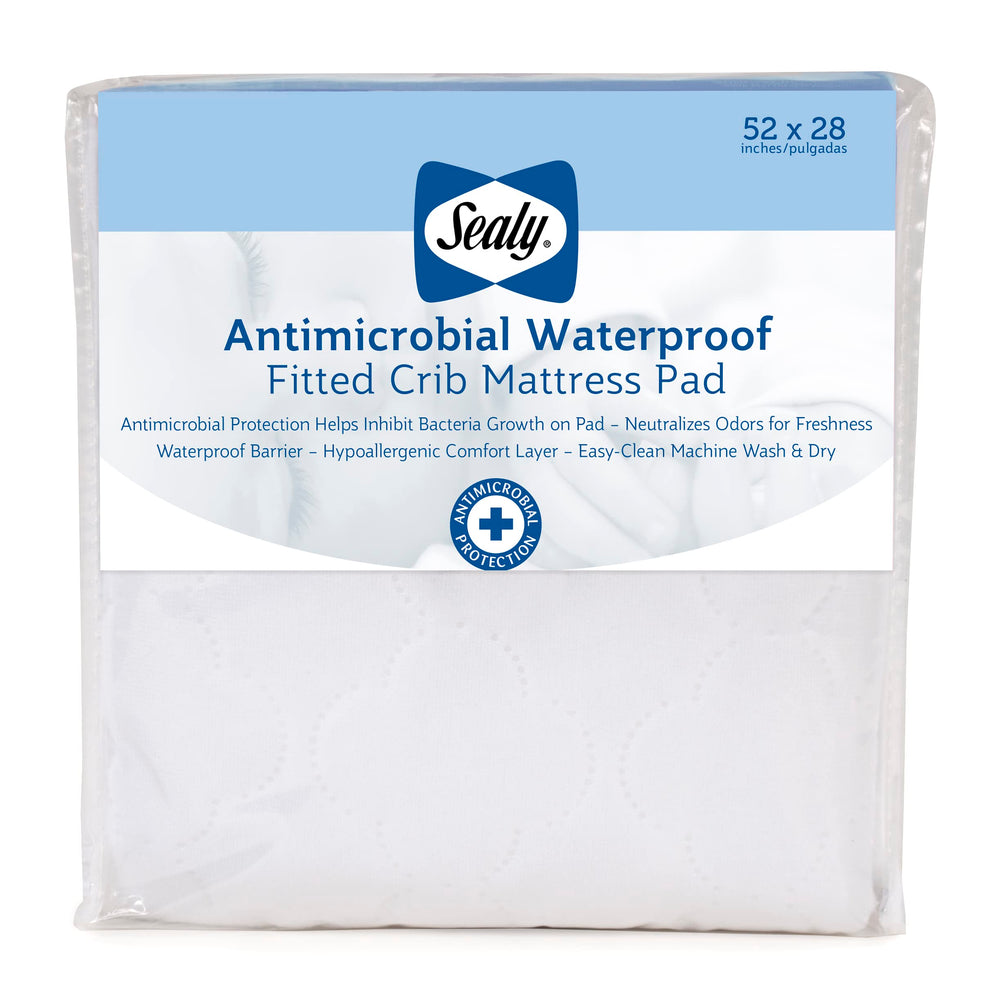 SEALY BABY antimicrobial waterproof mattress pad top view shows fresh, odor-neutralizing protection.