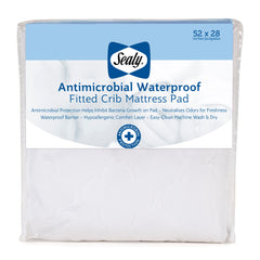 SEALY BABY antimicrobial waterproof mattress pad top view shows fresh, odor-neutralizing protection.