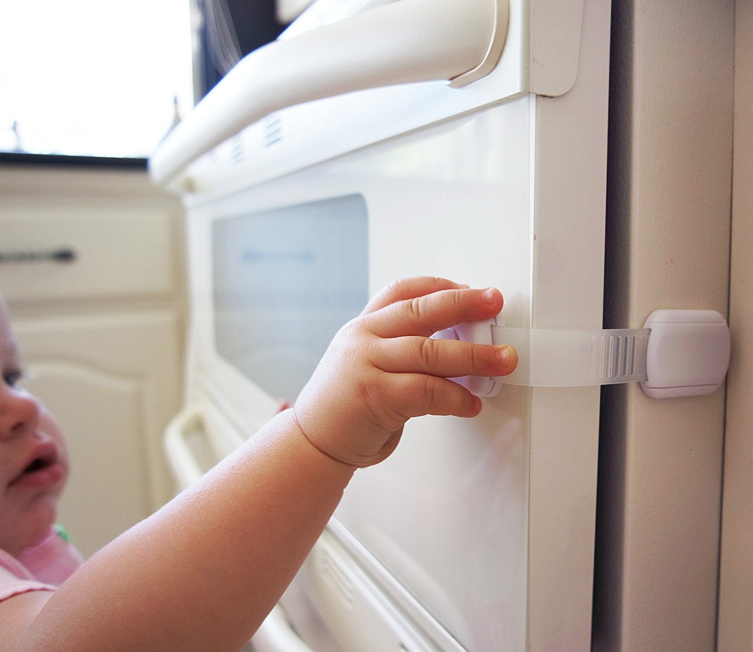 Latch system with adjustable strap enables simple one-handed adult access for safety.