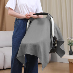 Seejoy car-seat canopy in use outdoors protecting baby from sun and wind.