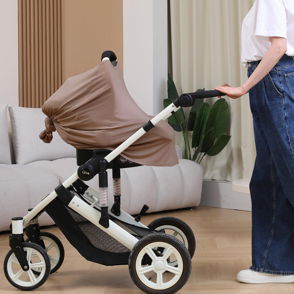 Seejoy stroller sun protection cover shields baby from sun while you remain hands-free.