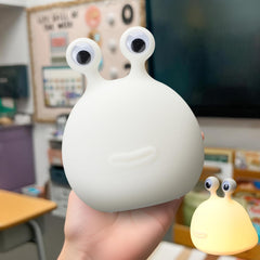 Seenelling slug night light with eye taps on, warm glow for bedtime routine