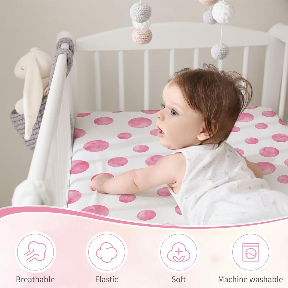 Sel Natural four sided elastic edging close-up for snug crib fit