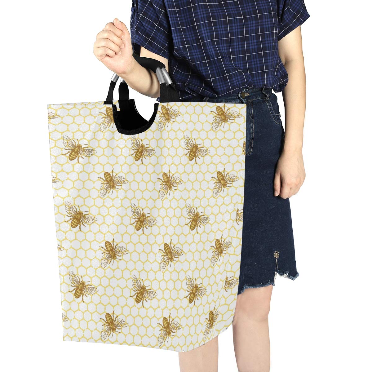 Senya Bee and Honeycomb Basket decor-friendly storage enhances room tidiness.