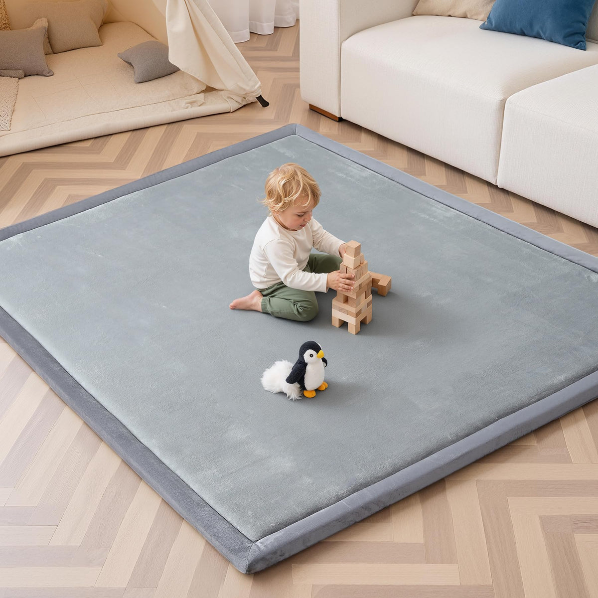 SEPARO baby play mat with soft plush surface offers comfortable tummy time on hard floors.