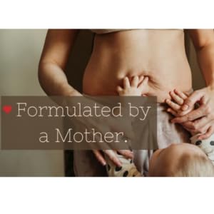 Happy Hiney balm being applied to tiny skin demonstrates gentle nourishment.
