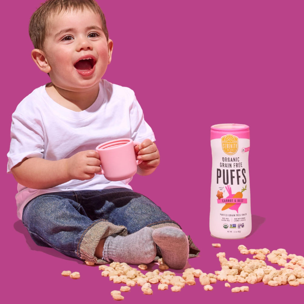Serenity Kids puffs texture closeup showing melt-in-mouth self-feeding practice.