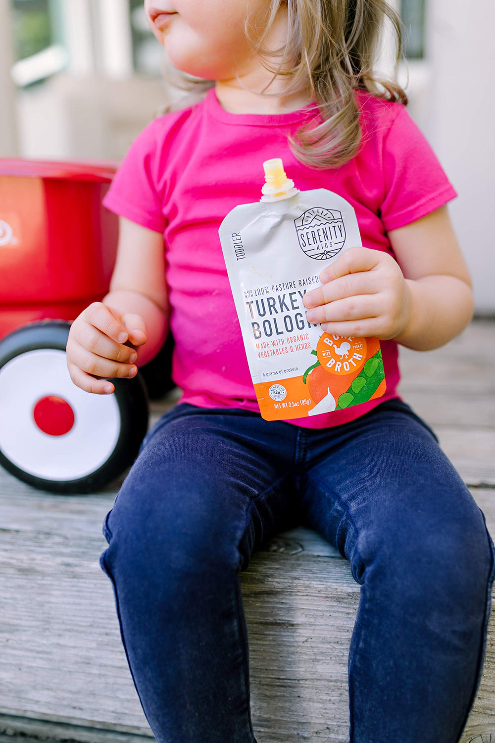 Serenity Kids clean-label purity award badge on pouch packaging.