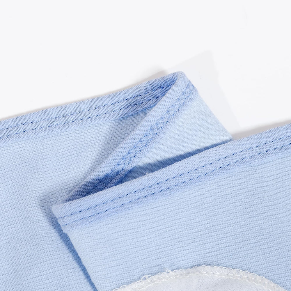 SEVDO swaddles in use showing easy diaper changes mid-sleep