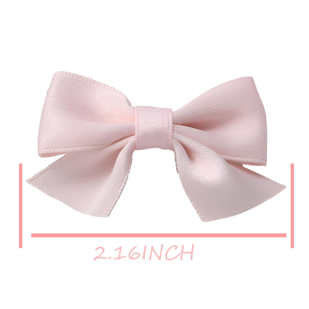 Sevenhead light green bow hair clip pair demonstrates versatile accessory for outfits.
