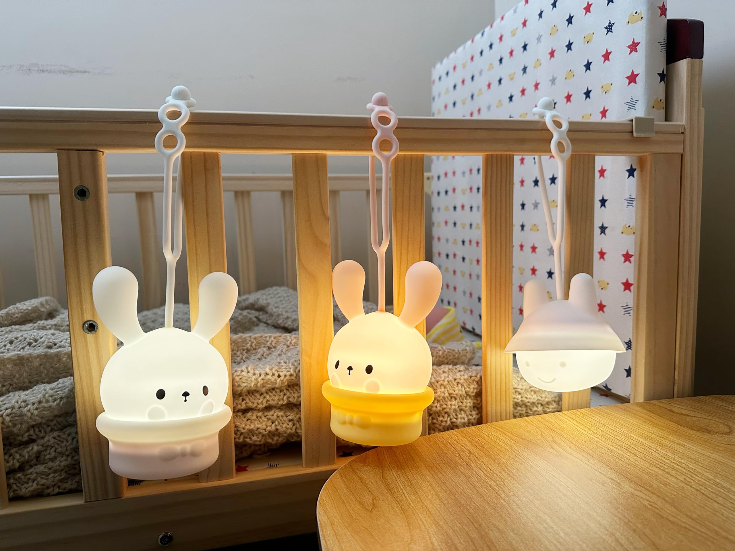ShaArkMango Bunny night light on crib shelf provides gentle, sleep-friendly illumination.
