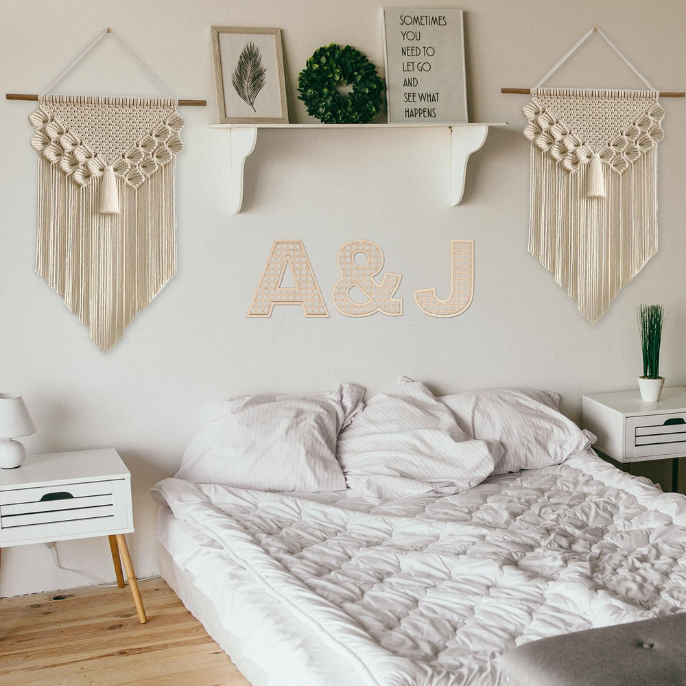 Rustic wedding decor using She Love wooden rattan letters for signage.