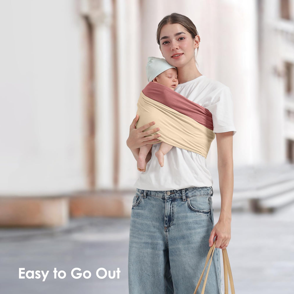 Shiaon baby wrap cream pink privacy-friendly breastfeeding shield in use.