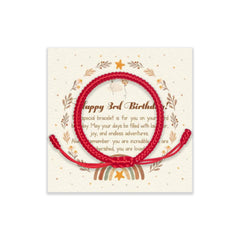 Shop300 adjustable red string bracelet on a child's wrist, comfortable all-day wear.