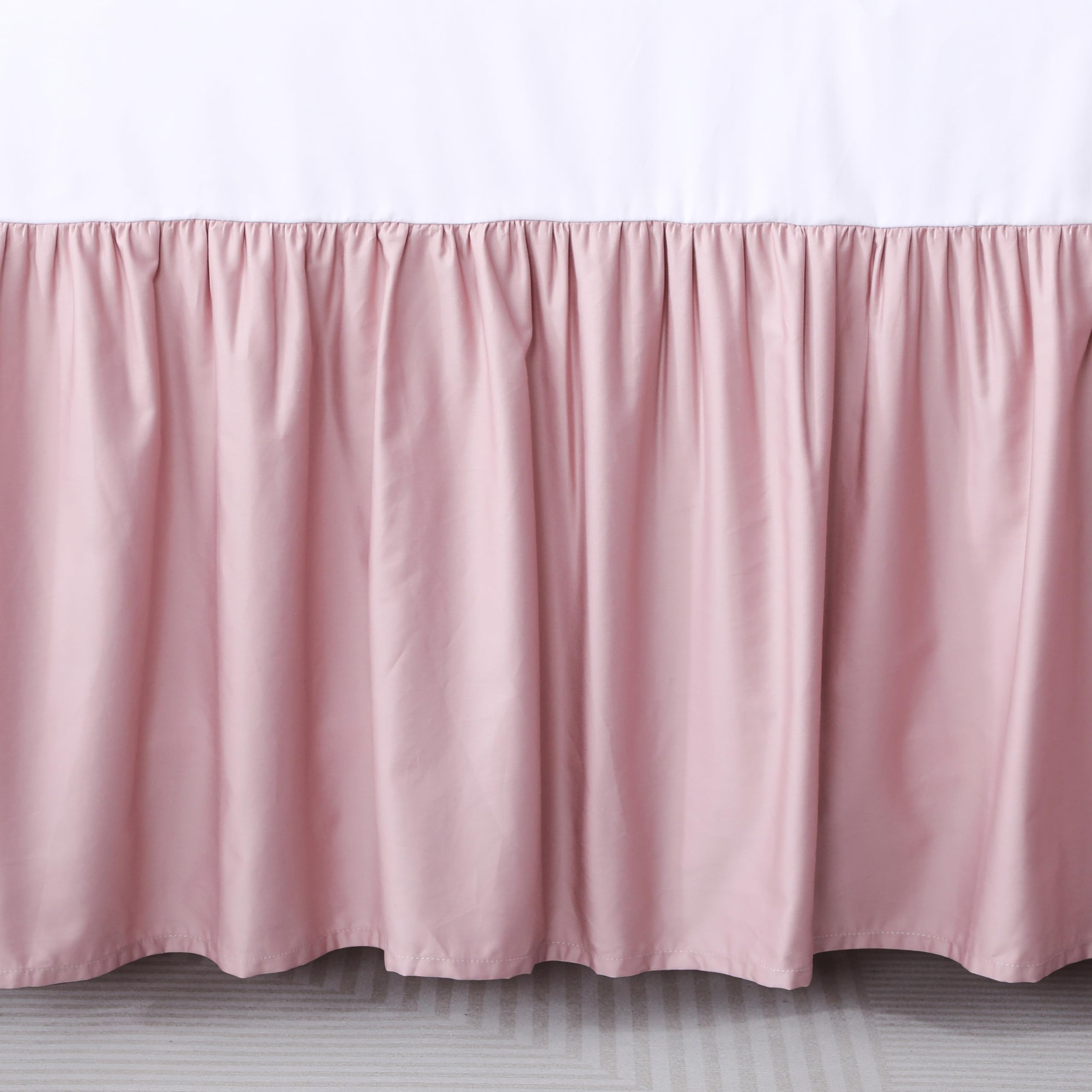 Shunjie.Home pink dust ruffle complements nursery decor and softens the crib aesthetic.