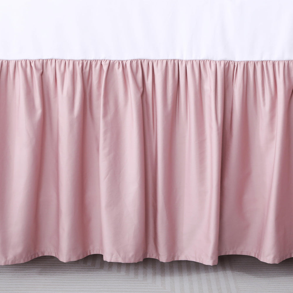 Shunjie.Home pink dust ruffle complements nursery decor and softens the crib aesthetic.