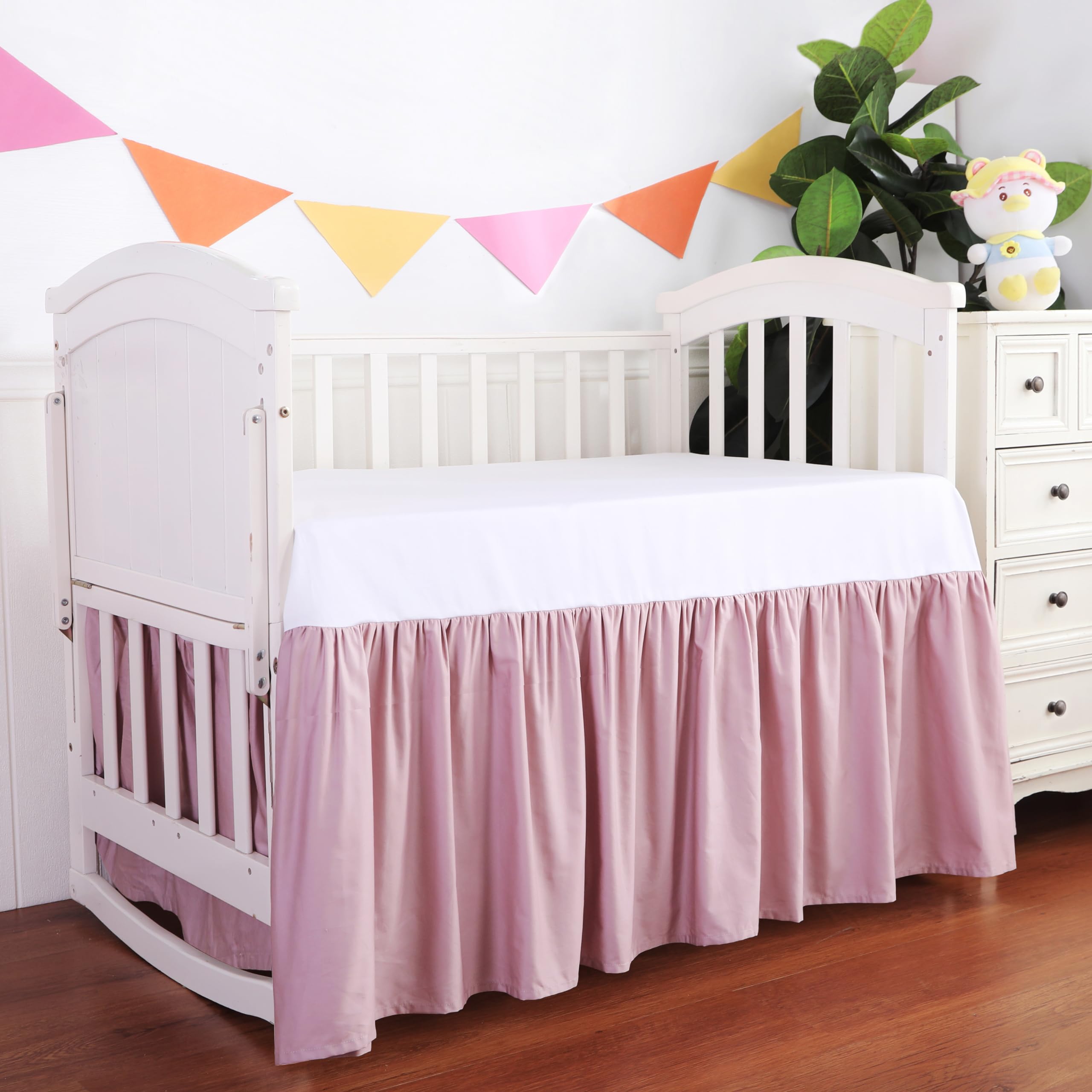 Shunjie.Home crib skirt hides under-bed storage neatly for a tidier nursery.