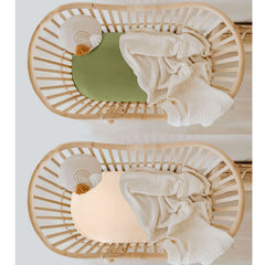 Two-color satin bassinet sheet set ready for easy nursery styling