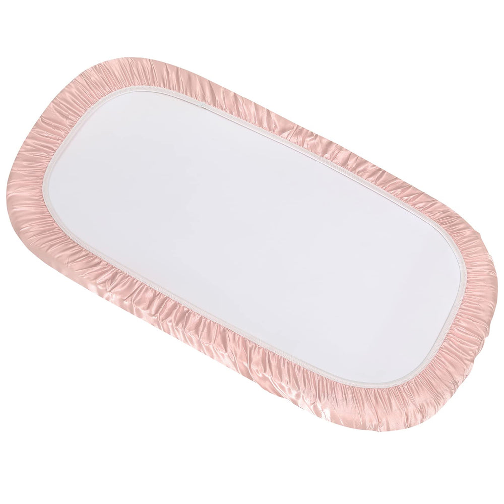 SiinvdaBZX satin bassinet sheet pink elastic edge visible for secure, safe fitting.