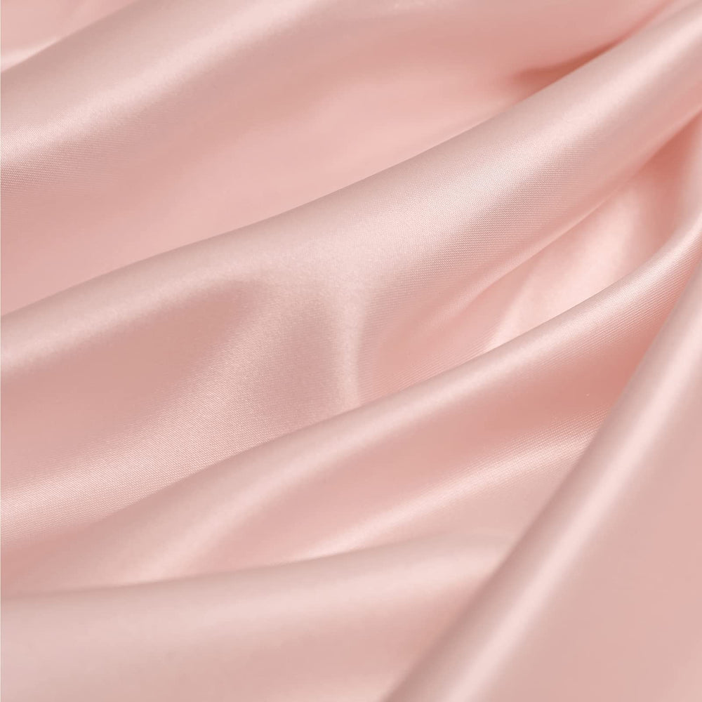 SiinvdaBZX satin bassinet sheet pink 4-inch pocket demonstrates snug, tailored fit.