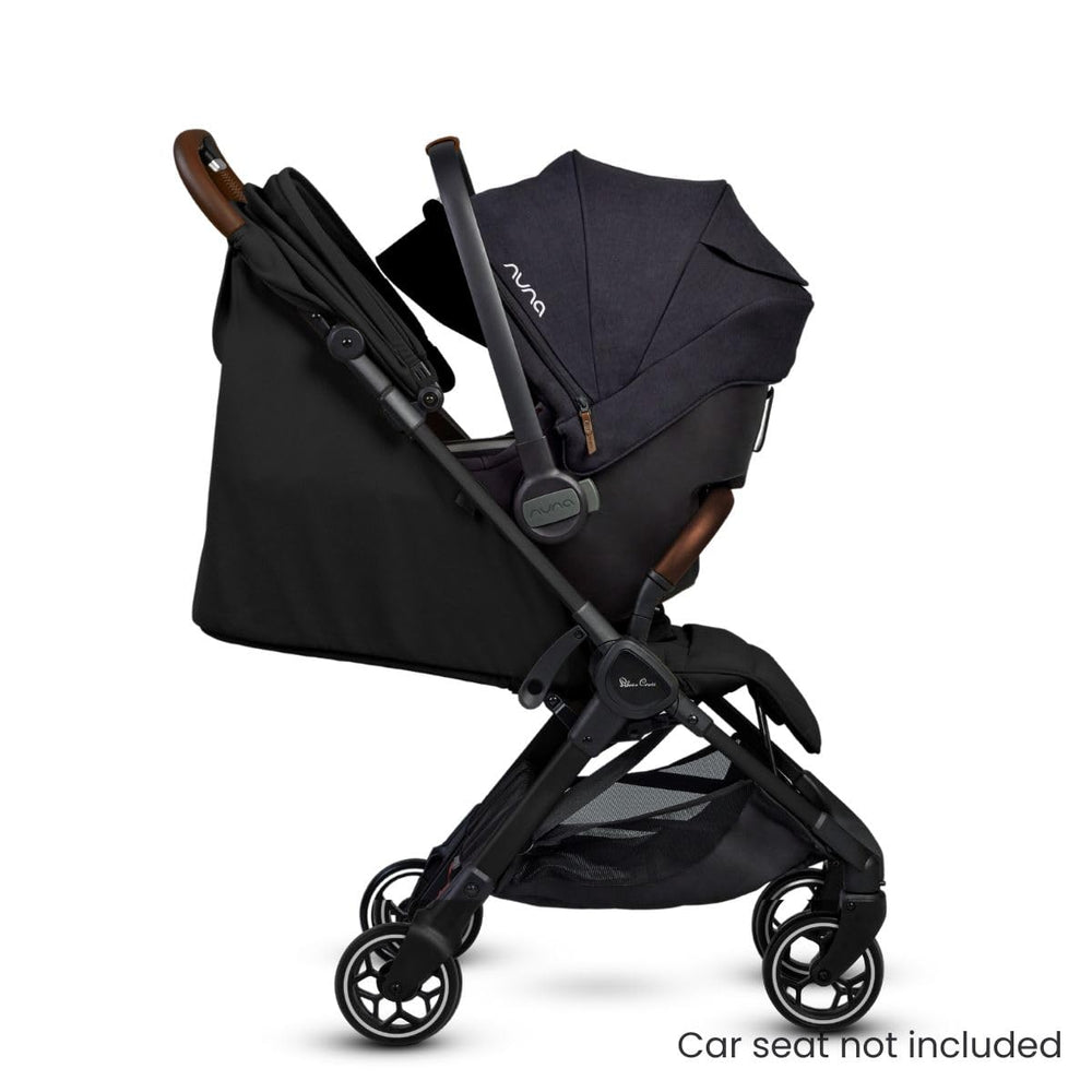 Silver Cross Clic magnetic buckle safety adds quick secure harness.