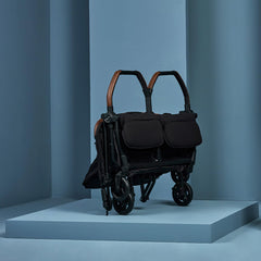 Silver Cross Jet Double folded self-stand demonstrates compact storage solution.