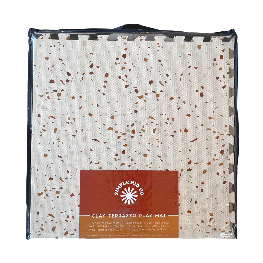 Simple Kid Co interlocking tiles create a spacious 4x6 ft play area for tummy time.