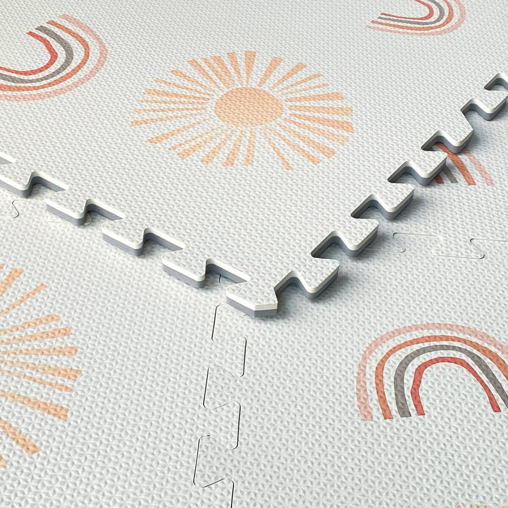 Simple Kid Co interlocking tiles closeup demonstrates secure puzzle joining.