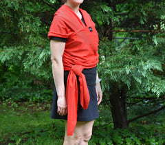 Simply Essential Solutions baby wrap stretchy fabric being wrapped demonstrates even weight distribution.