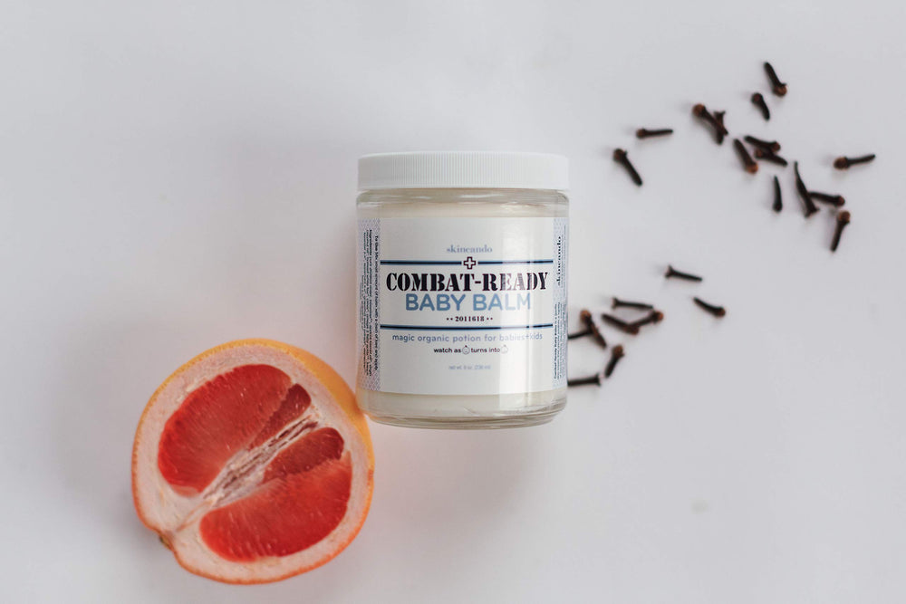 Skincando Combat Ready Baby Balm ingredients panel — highlights apricot kernel oil for gentle hydration.