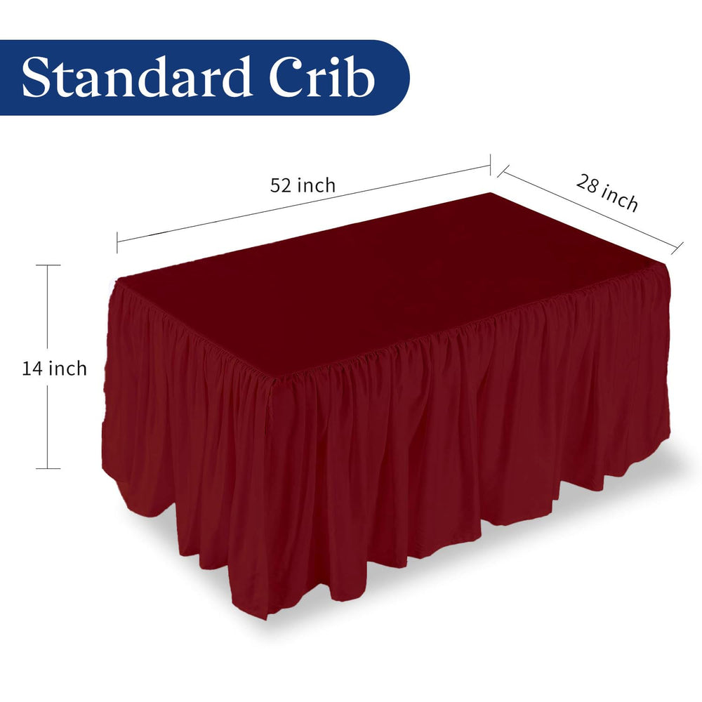 Sky Beddings burgundy crib skirt split corners—easy fit around posts and wheels.
