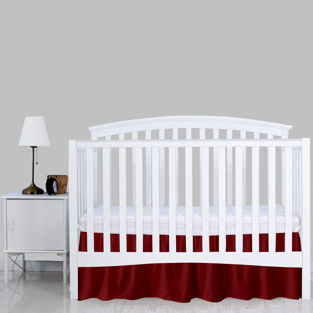 Sky Beddings burgundy crib skirt under-crib storage concealment for diapers and toys.