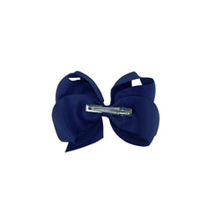 SKYii navy blue 3-inch bow clip, petite touch for toddlers' hairstyles.