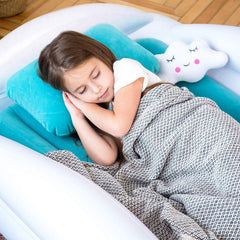 Sleepah travel bed shows crib-sheet compatibility for easy bedding.