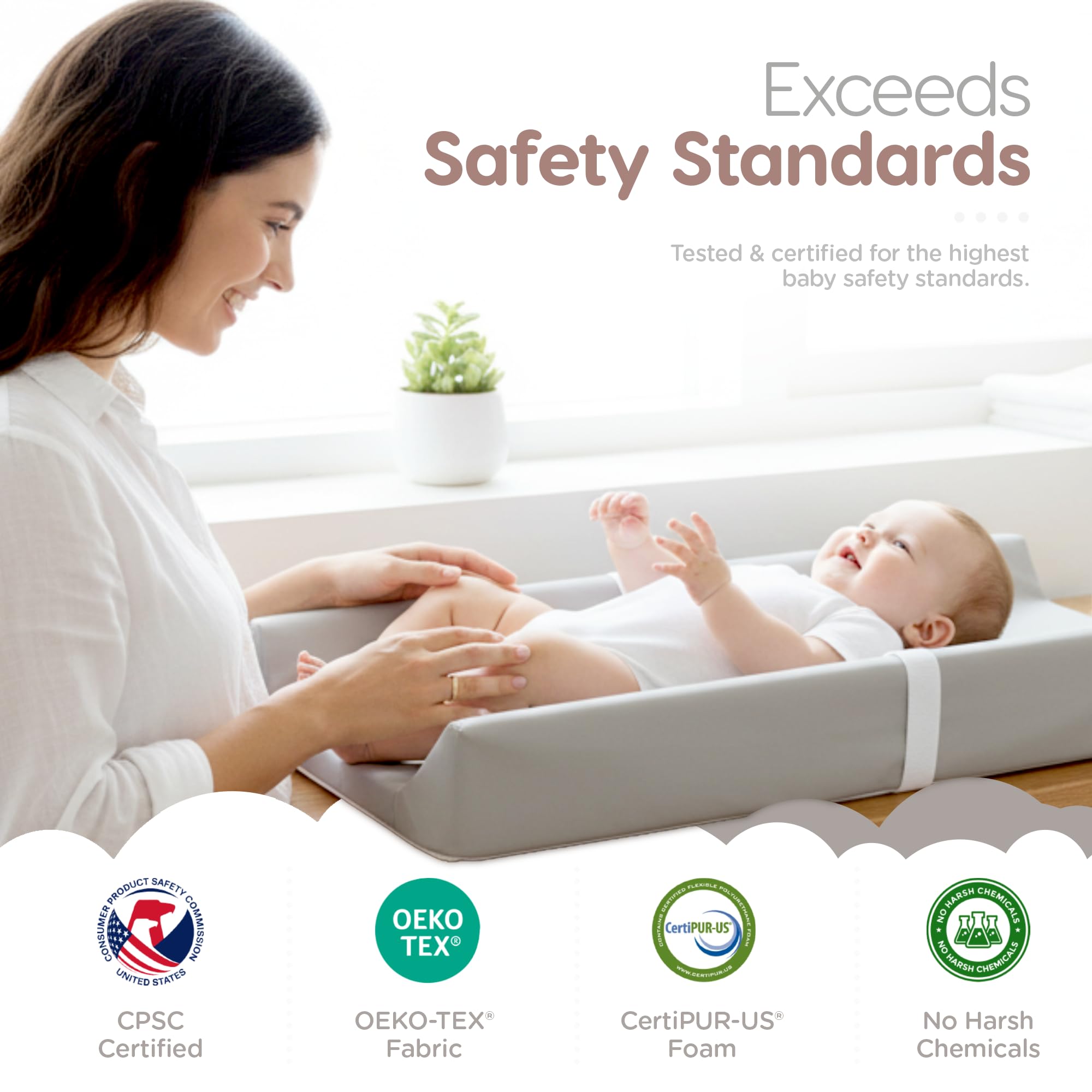 Sleepah changing pad secure belt keeps baby snug during changes.