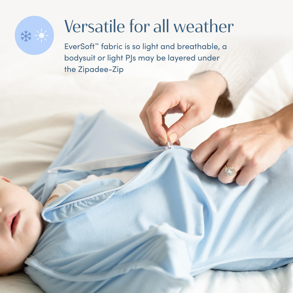 SleepingBaby Easy diaper-change zipper-guards highlight quick access while keeping baby safe.