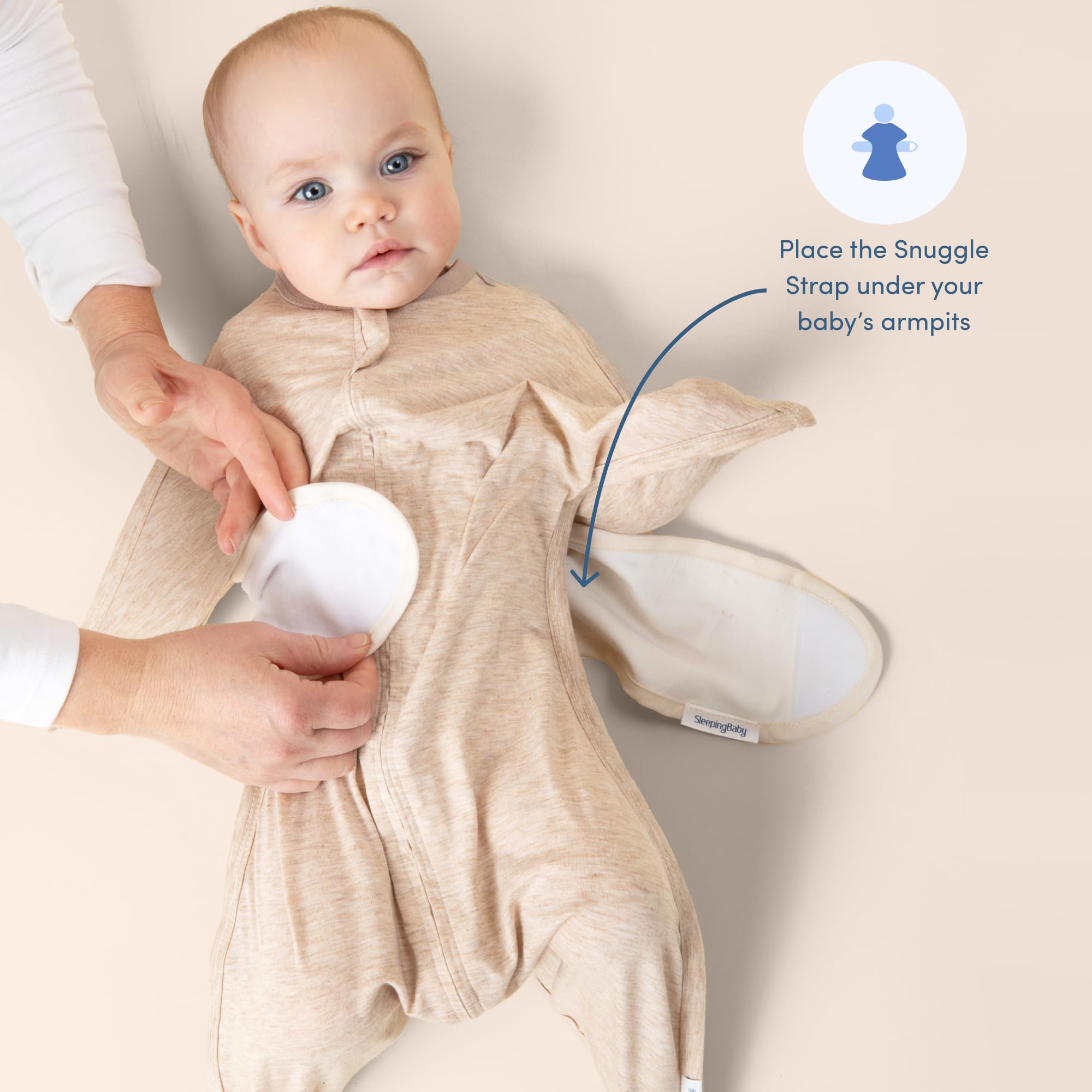 SleepingBaby Snuggle Strap allows arm mobility while wrapped for security.