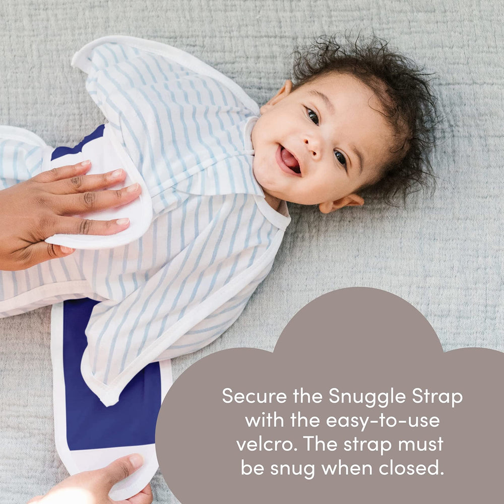 SleepingBaby Zipadee-Zip Snuggle Strap worn in a navy baby setup in nursery