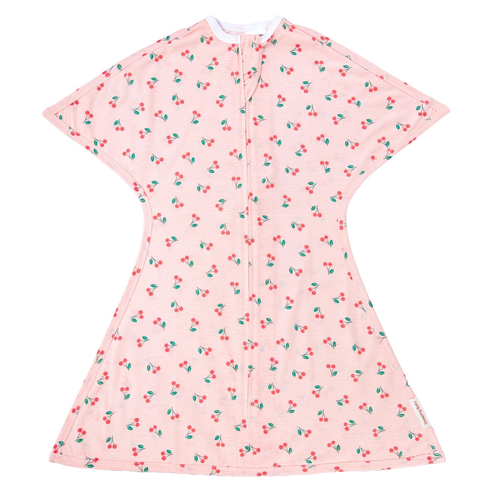 SleepingBaby Zipadee-Zip swaddle with cherries print supports cozy arms-up sleep