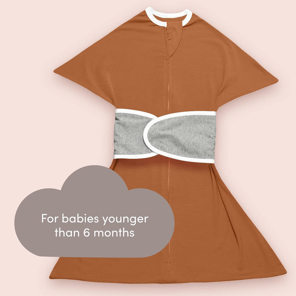 SleepingBaby Zipadee-Zip transition view shows snug strap for safer sleep setup.