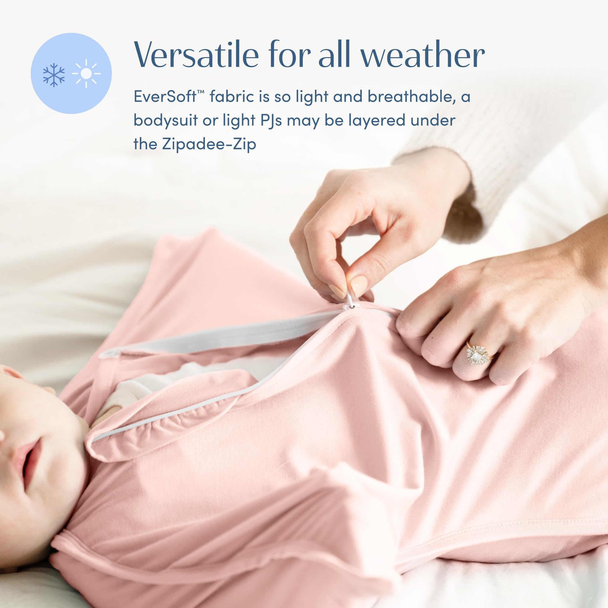 SleepingBaby zipper guards keep tiny fingers safe during changes.