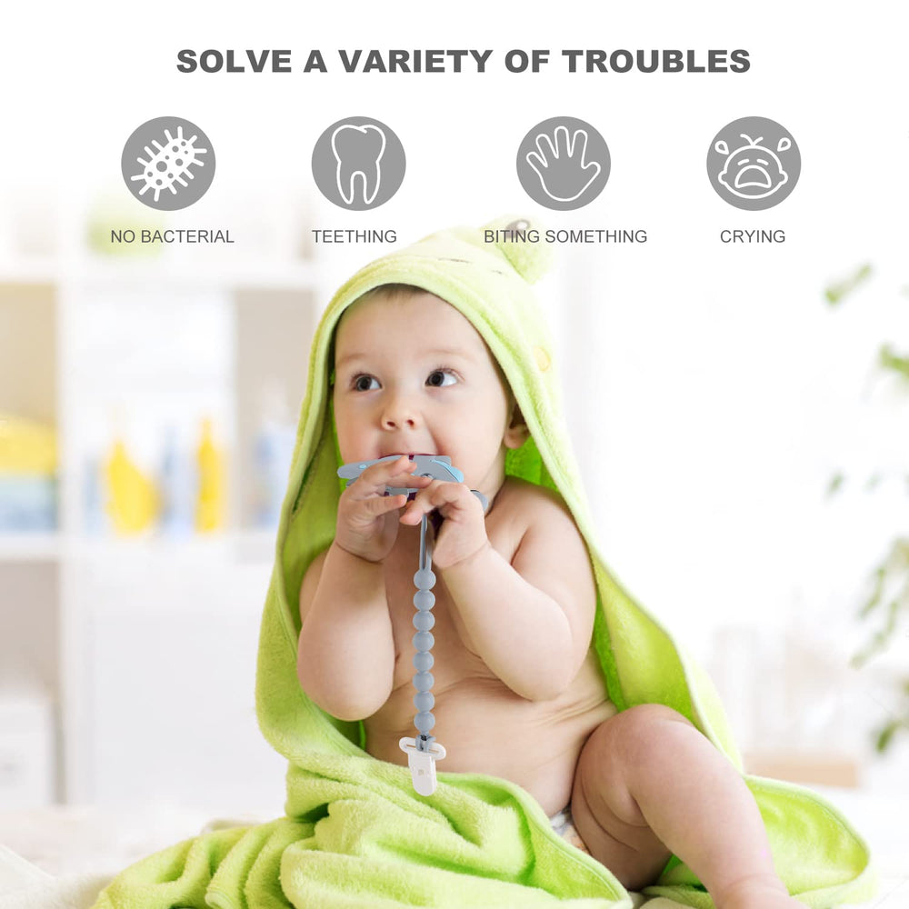Slotic dinosaur teether close-up highlights durable food-grade silicone