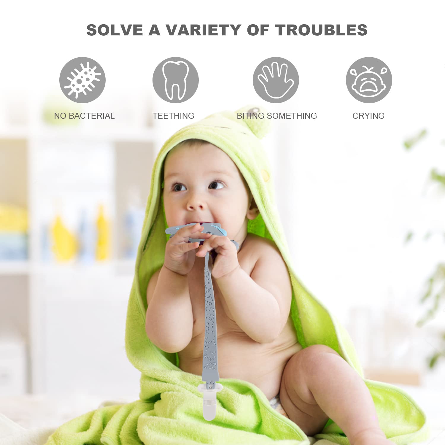 Slotic pacifier clip close-up demonstrates secure, fall-prevention clip.