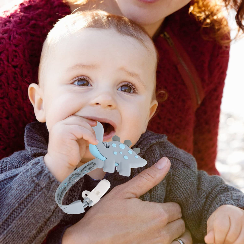 Slotic teether freezer-safe feature shown as a cooling option for teething relief.