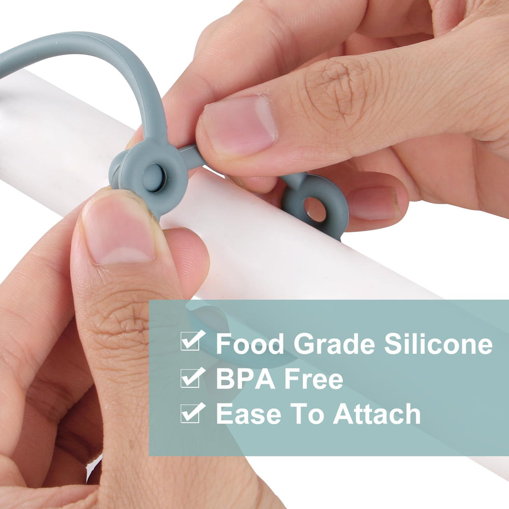 Slotic adjustable silicone strap attachment secures toys and cups on the go.