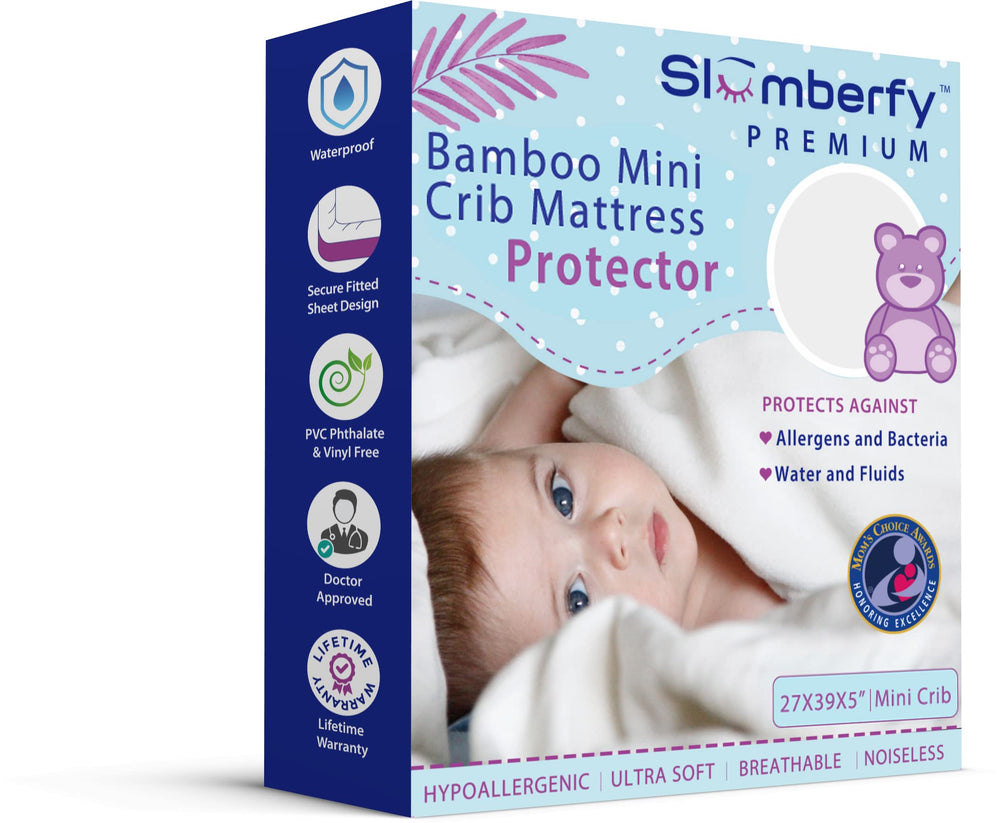 Slumberfy mini crib protector close-up shows bamboo fabric for clean sleep surface