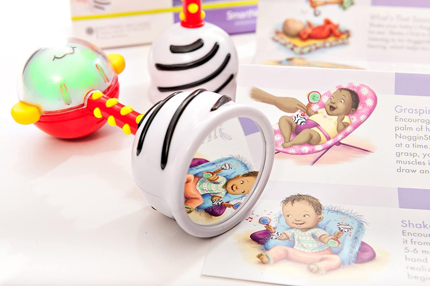 SmartNoggin Baby's First Book 44 Sounds Teether aids safe oral exploration.
