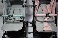 Smile Saki twin stroller connector installation showing secure setup with short tubes and reinforcement.